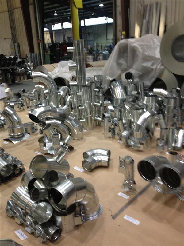 Tool install fittings laid out on the shop floor