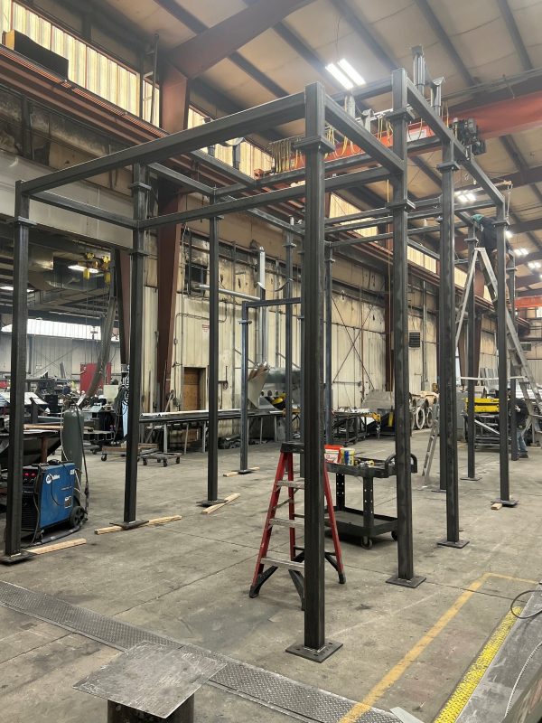 Welded steel support frames assembled on the shop floor